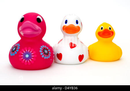 Three colourful rubber ducks on a white background Stock Photo