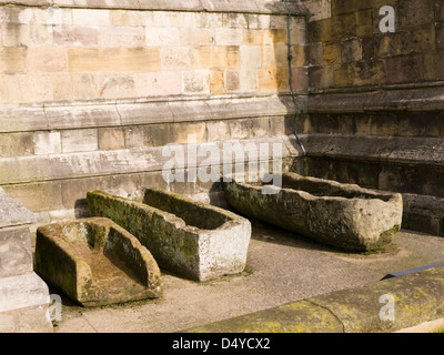 Stone carved coffins near Ripon Cathedral North Yorkshire England Stock Photo