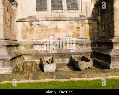 Stone carved coffins near Ripon Cathedral North Yorkshire England Stock Photo