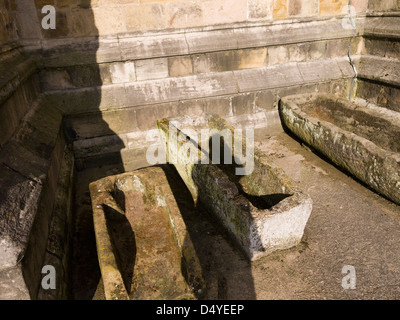 Shadows on Stone carved coffins near Ripon Cathedral North Yorkshire England Stock Photo