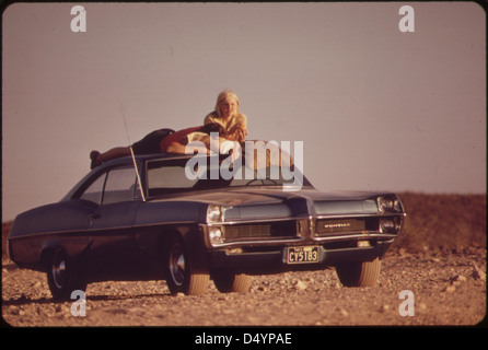 Visitors sunbathing at Lake Mead, May 1972 Stock Photo