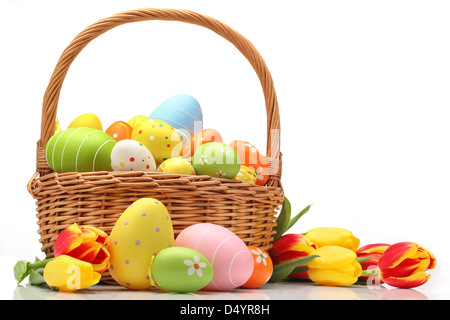 Easter eggs in a wicker basket Stock Photo