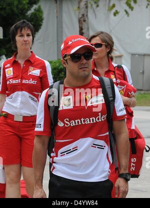 Sepang, Malaysia. March 21, 2013.   Scuderia Ferrari Formula One driver Felipe Massa of Brazil walking through paddock area in the Sepang International Circuit on Formula One 2013 Malaysian Grand Prix. Credit: Robertus Pudyanto/Aflo/Alamy Live News Stock Photo