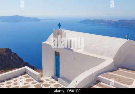 Small clifftop church in Imerovigli on the greek island of Santorini. Stock Photo