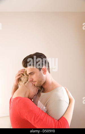 Man comforting sad woman Stock Photo