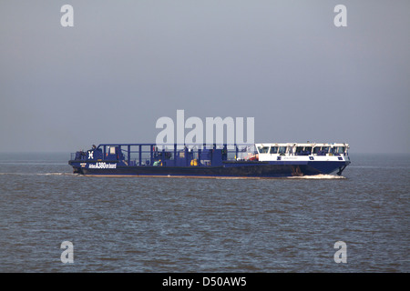 The Wales Coastal Path in North Wales. The Afon Dyfrdwy Airbus A380 wing transport vessel on the River Dee. Stock Photo