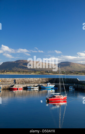 Sailing boats in Mullaghmore harbour beneath the Sligo Hills, County Sligo, Ireland. Stock Photo