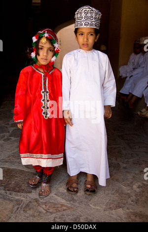 Young Omani school children in Traditional costumes on a school visit ...