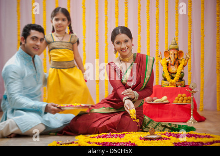 Maharashtrian family celebrating Ganesh Chaturthi Stock Photo