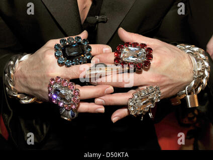 Fashion designer Harald Gloeckler displays his extravagant rings as he presents his fashion line 'by Gloeckler' in Berlin, Germany, 01 December 2010. Gloeckler created the line exclusively for the mail-order company Klingel. Photo: JENS KALAENE Stock Photo