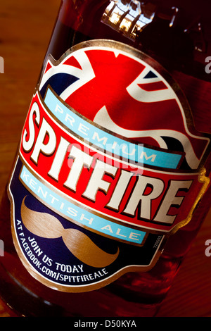 Close up view of Spitfire brand beer label on a bottle of real ale made by Kentish brewer Shepherd Neame for the UK market Stock Photo