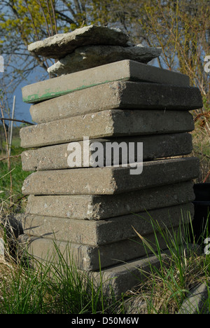 Concrete and natural stone garden pavers. Stock Photo