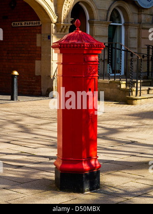 Traditional red painted Victorian letter box in Market Square Stafford Staffordshire UK Stock Photo