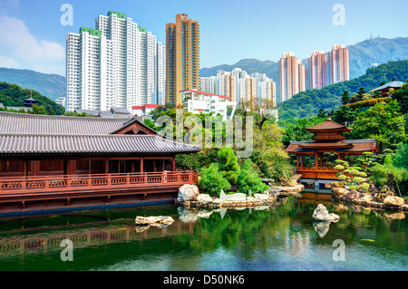 Pond and cityscape viewed from Nan Lian Garden in Hong Kong, China. Stock Photo