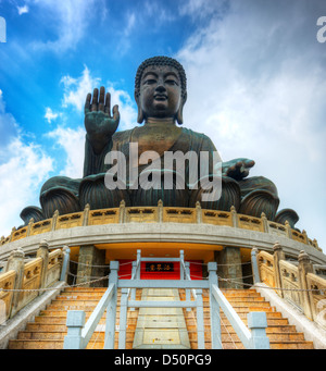 Tian Tan Buddha (Great Buddha) is a 34 meter Buddha statue located on Lantau Island in Hong Kong. Stock Photo