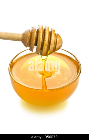honey in glass jar isolated Stock Photo