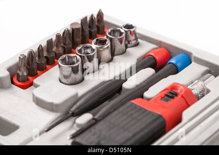 open toolbox with screwdriver, heads and bits Stock Photo