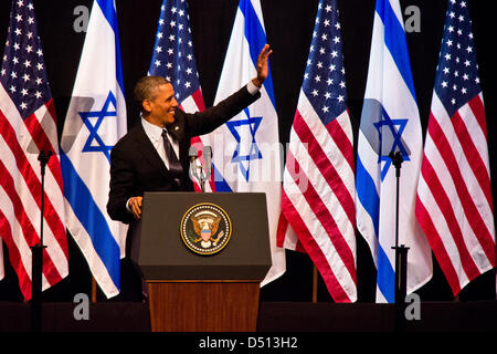 US President Barack Obama greets hundreds of young Israeli students with the word 'Shalom!' (hello, peace - Hebrew). Jerusalem, Israel. 21-March-2013.  US President Barack Obama addresses hundreds of young Israel students at the Jerusalem International Convention Center. Speaking to these students Obama bypasses politicians with a message of peace and is warmly welcomed with standing ovations. Stock Photo