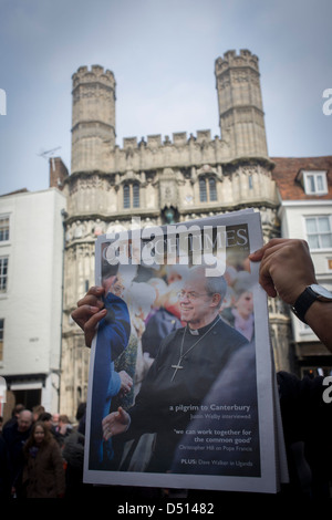 Canterbury 21/3/2013 - The Anglican Church Times is handed out as VIP guests from all religions, denominations and faiths arrive before the enthronement of the Church of England's 105th Archbishop of Canterbury, ex-oil executive and former Bishop of Durham the Right Reverend Justin Welby. Welby (57) follows a long Anglican heritage since Benedictine monk Augustine, the first Archbishop of Canterbury in 597AD Prince Charles and Prime Minister David Cameron joined 2,000 VIP guests to Canterbury Cathedral, the oldest church in England. Stock Photo