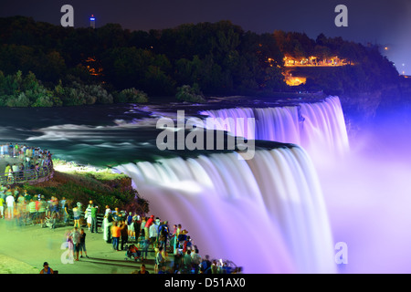 Niagara Falls lit at night by colorful lights Stock Photo