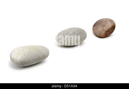 Three Pebble Stones in a Row Stock Photo