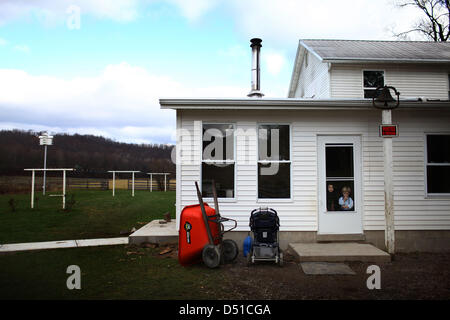 Dec 05, 2012 - Bergholz, Ohio, U.S. - Two young Amish children wait for the mother at the Mullet farmhouse outside Bergholz, Ohio. (Credit Image: © Michael Francis McElroy/ZUMAPRESS.com) Stock Photo