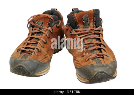 dirty hiking leather shoes after coming from the mountains Stock Photo