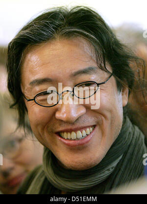 A file picture dated 12 September 2009 shows Chinese author and poet Bei Ling before the beginning of a symposium in Frankfurt, Germany. Ling has speedily written a biography of his friend, Nobel Peace Prize laureate Liu Xiaobo. 'A sacrifice for freedom - The biography of the Nobel Prize Laureate'. Photo: Marius Becker Stock Photo