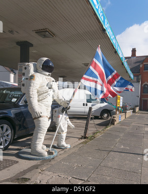Astronaut figures with UK flag at car wash within Bishop Auckland, north east England, UK Stock Photo
