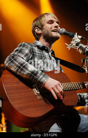 Singer Peter Brugger performs on stage during a concert of his band 'Sportfreunde Stiller' at O2 World Arena in Hamburg, Germany, 13 December 2010. Photo: Malte Christians Stock Photo