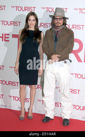 US actors Angelina Jolie and Johnny Depp attend the photocall of the German premiere of the movie 'The Tourist' at the Adlon hotel in Berlin, Germany, 14 December 2010. 'The Tourist' will be presented in German cinemas from 16 December 2010 onwards. Photo: Hubert Boesl Stock Photo