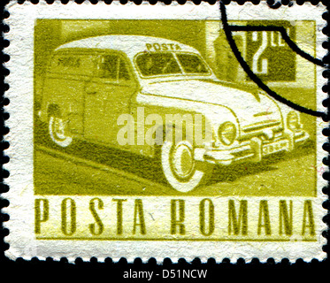 ROMANIA - CIRCA 1968: A stamp printed in the Romania shows Mail truck, circa 1968  Stock Photo