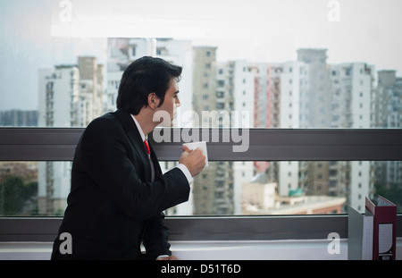 Businessman having coffee Stock Photo
