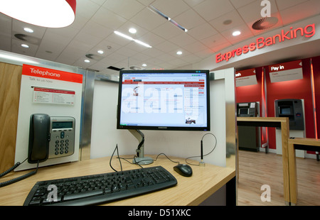 Internet banking screen inside a new HSBC bank, The Hongkong and Shanghai banking corporation. Stock Photo