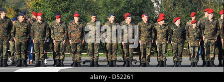 Bundeswehr soldiers stand in line at the Bundeswehr camp in Kundus ...