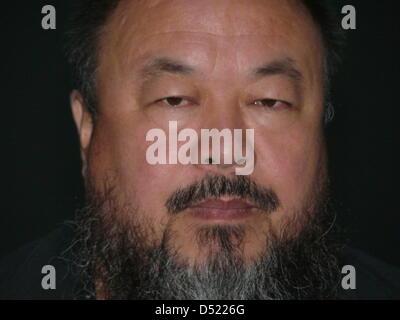 Ai Weiwei at the Tate Modern in London, Great Britain, 11 October 2010. The Chinese artist presented an installation made out of 100 million handmade porcelain sunflower seeds for Tate Modern's Unilever Series. Photo: Barbara Bentele Stock Photo