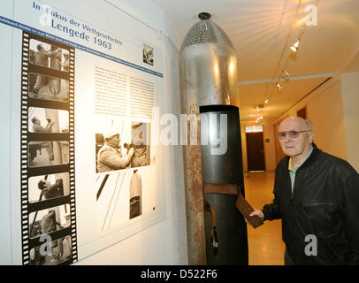 Siegfried Ebeling, a survivor of the mining drama of Lengede, poses at a reproduction of the Dahlbusch bomb in the town hall of Lengede, Germany, 12 October 2010. The 79 year-old was one of eleven miners that were trapped in an abandoned shaft for 14 days, before they were rescued on 3 November 1963. The rescue operation with the Dahlbusch bomb became widely know as the 'Miracle of Stock Photo