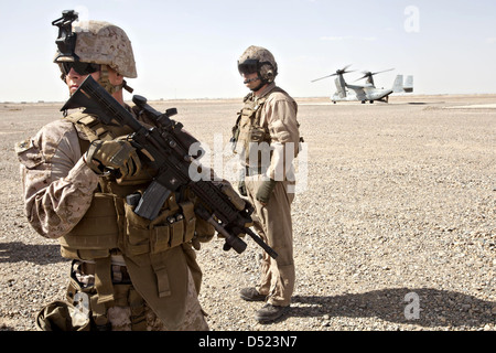 US Marines prepare to board an MV-22 Osprey helicopter March 16, 2013 at Camp Dwyer, Helmand Province, Afghanistan. Stock Photo