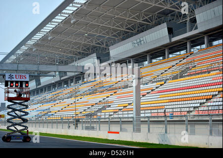 A technician works on the starting signal at the Korean International Circuit in Yeongam, South Korea, 20 October 2010. The last but two Formula One 2010 race, the Grand Prix of South Korea, will take place on the circuit that was finished last minute on 24 October 2010. Photo: David Ebener Stock Photo