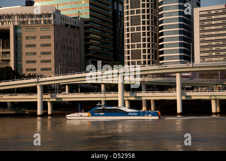 Brisbane River Ferry Citycat passing Brisbane CBD Queensland Australia. Stock Photo