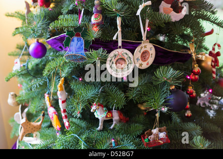 Ornaments on Christmas tree Stock Photo