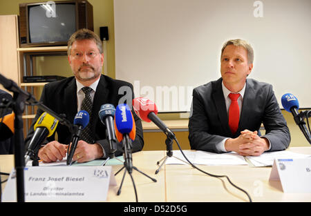 Franz Josef Biesel (L), head of Saarland's state criminal police office (LKA) and prosecutor Bernd Meiners provide details on the arrest of a suspected Cameroon-born terrorist in Neunkirchen, Germany, 05 November 2010.The 18-year-old had been under surveillance for months. In videotaped messages, he had threatened to perform acts of terror in case the terrorist Daniel Schneider was Stock Photo