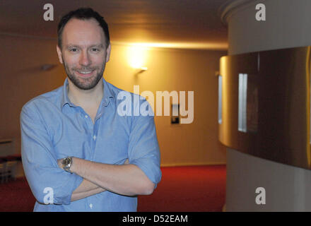 Norwegian director Alexander Mork-Eidem smiles for the photographer on the sidelines of a dress rehearsal of his staging of  Georg Friedrich Haendel's 'Orlando ...' in Berlin, Germany, 23 February 2010. His adaption will premiere at Berlin's 'Komische Oper' on 26 February 2010 and is set to be staged until July 2010. Photo: JENS KALAENE Stock Photo