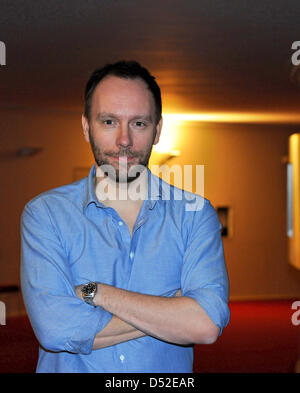 Norwegian director Alexander Mork-Eidem smiles for the photographer on the sidelines of a dress rehearsal of his staging of  Georg Friedrich Haendel's 'Orlando ...' in Berlin, Germany, 23 February 2010. His adaption will premiere at Berlin's 'Komische Oper' on 26 February 2010 and is set to be staged until July 2010. Photo: JENS KALAENE Stock Photo