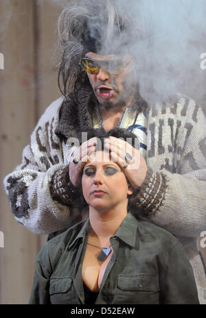 Wolf Matthias Friedrich (top) as Zarathustra and Mariselle Martinez as Orlando perform on stage during the photo rehearsal of Georg Friedrich Haendel's 'Orlando ...' in Berlin, Germany, 23 February 2010. The adaption by Norwegian director Alexander Mork-Eidem will premiere at Berlin's 'Komische Oper' on 26 February 2010 and is set to be staged until July 2010. Photo: JENS KALAENE Stock Photo