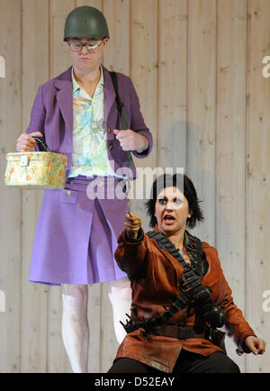 Bernd Stempel (L) as Isabella and Mariselle Martinez as Orlando perform on stage during the photo rehearsal of Georg Friedrich Haendel's 'Orlando ...' in Berlin, Germany, 23 February 2010. The adaption by Norwegian director Alexander Mork-Eidem will premiere at Berlin's 'Komische Oper' on 26 February 2010 and is set to be staged until July 2010. Photo: JENS KALAENE Stock Photo