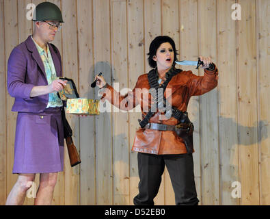 Bernd Stempel (L) as Isabella and Mariselle Martinez as Orlando perform on stage during the photo rehearsal of Georg Friedrich Haendel's 'Orlando ...' in Berlin, Germany, 23 February 2010. The adaption by Norwegian director Alexander Mork-Eidem will premiere at Berlin's 'Komische Oper' on 26 February 2010 and is set to be staged until July 2010. Photo: JENS KALAENE Stock Photo