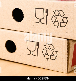 two boxes of pizza with the recycling symbol in square format Stock Photo