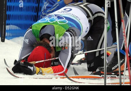 Axel Teichmann of Germany reacts after crossing the finish line the men's 50km Mass Start Cross Country Skiing event at the Vancouver 2010 Olympic Games, Whistler, Canada, 28 February 2010. Teichmann won silver. Photo: Peter Kneffel  +++(c) dpa - Bildfunk+++ Stock Photo