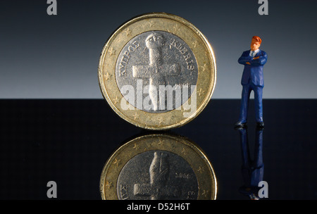Euro coin from Cyprus, miniature figurine of politician, banker, manager, or businessman Stock Photo